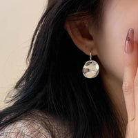 Radiant Orbit Earrings