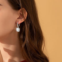 Floating Sparkle Earrings – Suspended Purity